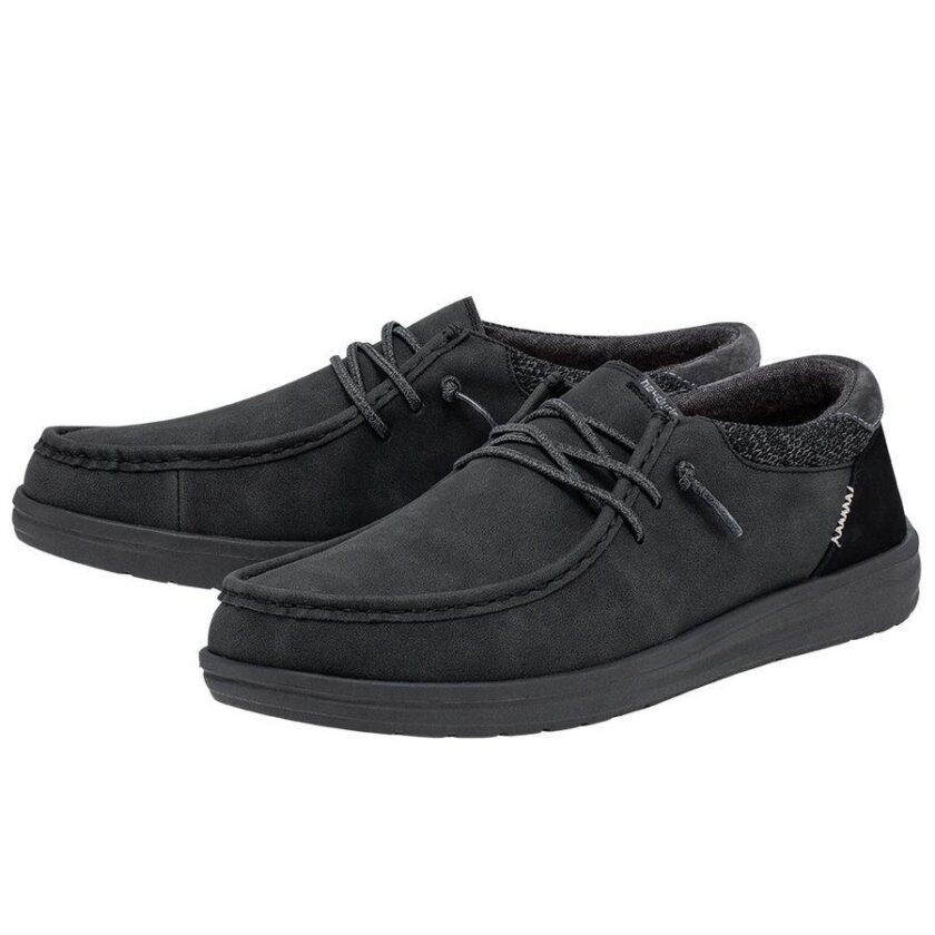 "Pair of Heydude 112294938 men's shoes in solid black, featuring moccasin-style stitching, elastic no-tie laces, and a cushioned low-profile outsole."