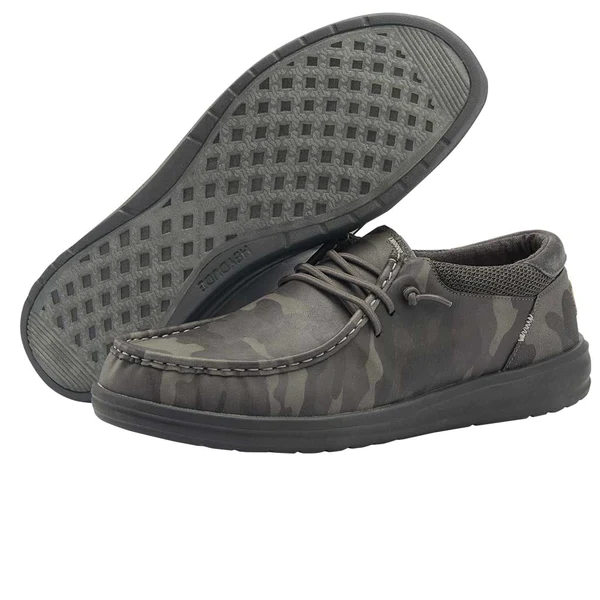 "Pair of Heydude 112297029 men's casual shoes in dark gray camouflage pattern, showing one shoe upright and the other with the sole facing forward, featuring gray laces and textured rubber sole."