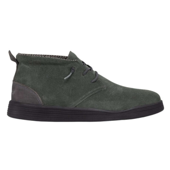 "Side view of Heydude 112378348 men's dark green suede shoe with black sole, black laces, and a pull tab at the heel."