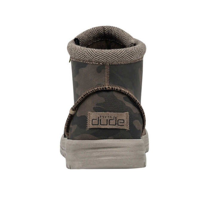 "Rear view of Heydude 113308339 camouflage ankle boot showing brown fabric heel tag with 'Hey Dude' branding and a herringbone-patterned padded collar."
