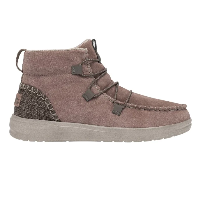 "Side profile of a HeyDude men's high-top casual shoe, model 122015006, featuring a brown suede upper, elastic brown laces, textured fabric heel patch, and a light gray sole."