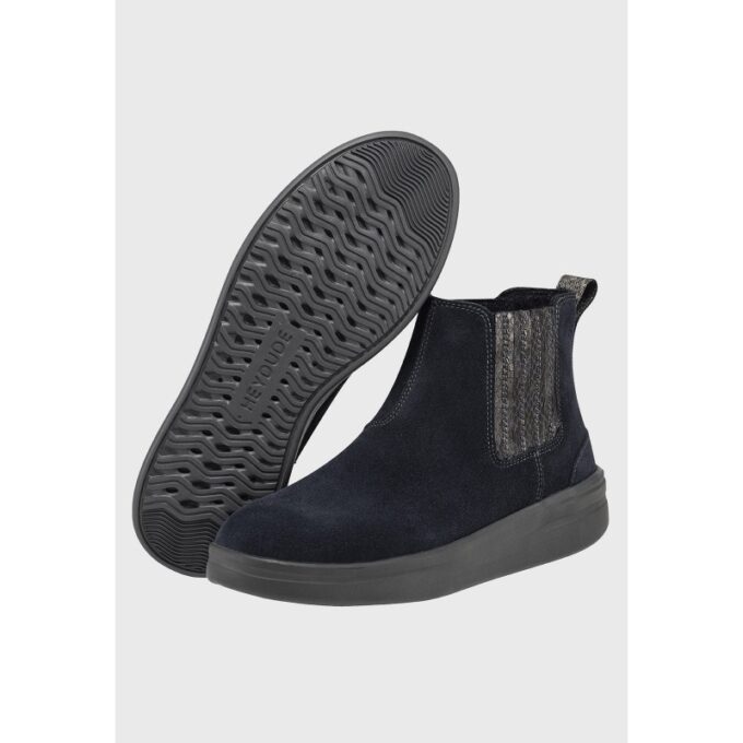 "Pair of Heydude 122022680 black suede ankle boots, one showing the side profile and the other tilted to display the textured rubber sole with 'HEYDUDE' branding, against a light gray background."