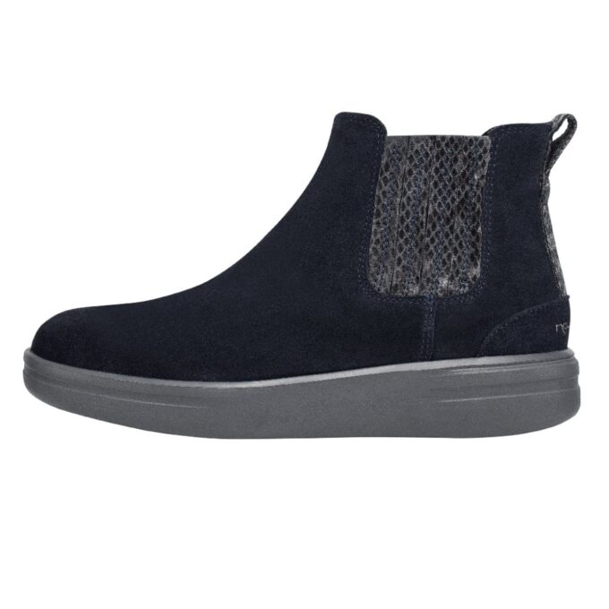 "Side view of a Heydude 122022680 black suede ankle boot with a textured elastic panel and pull tab on a white background."