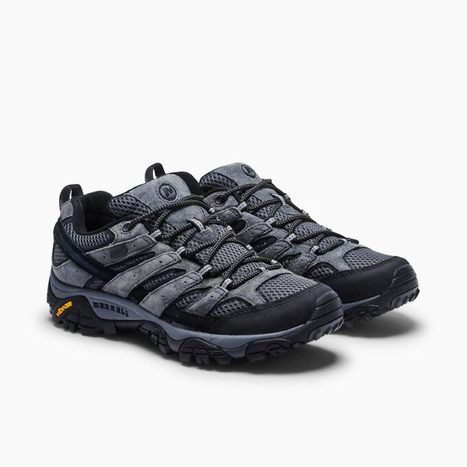 "Pair of Merrell J06031 hiking shoes in gray and black, featuring mesh and suede material, black and white laces, and yellow Vibram branding on the sole."
