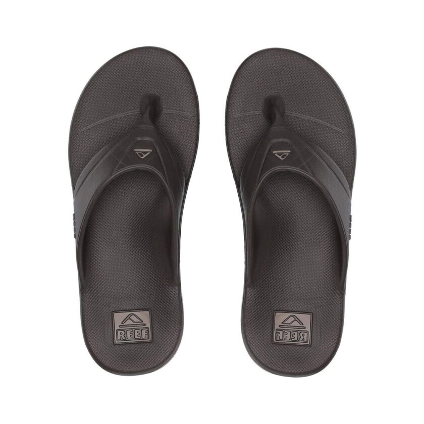 "Top view of Reef One RF0A3ONCBRO men's brown thong sandals, featuring a sleek, water-friendly design with textured footbeds and molded rubber straps for all-day comfort."