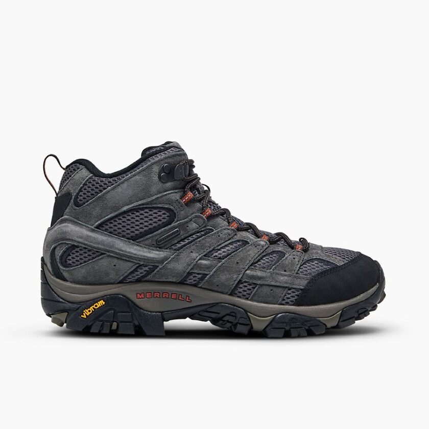 "Side view of a grey and black Merrell J06053 hiking boot with mesh panels, suede overlays, black rubber toe cap, and a Vibram outsole, displayed against a white background."