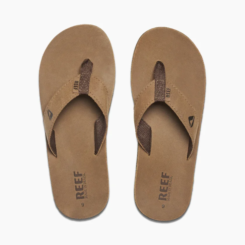 Top view of a pair of brown Reef RF000232BZB flip-flop sandals with dark brown straps."