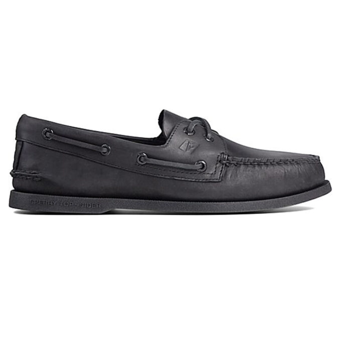 "Side profile view of black leather Sperry A/O 2 Eye boat shoe with moc toe and leather laces threaded through metal eyelets."