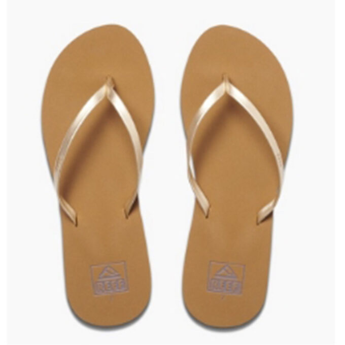 "Top-down view of a pair of Reef Bliss Nights sandals (RF0A2U1JTAH) in tan with metallic vegan leather straps, showing the Reef logo on the footbeds, against a white background."