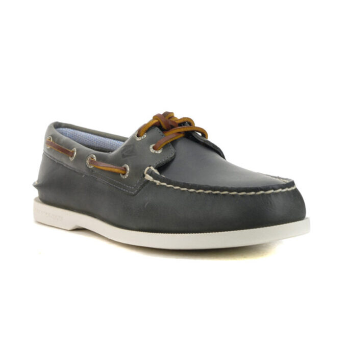 "Angled view of a dark gray Sperry A/O 2-Eye Plush Wave boat shoe with brown leather laces threaded through metal eyelets and a white rubber sole."