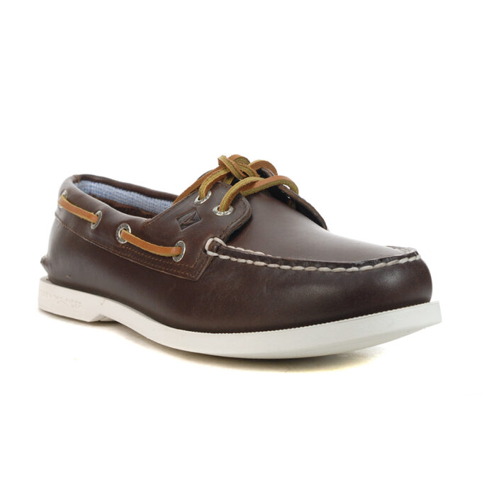 "Angled front view of a brown leather Sperry A/O Plushwave boat shoe with white stitching, tan leather laces threaded through metal eyelets, and a white rubber sole."